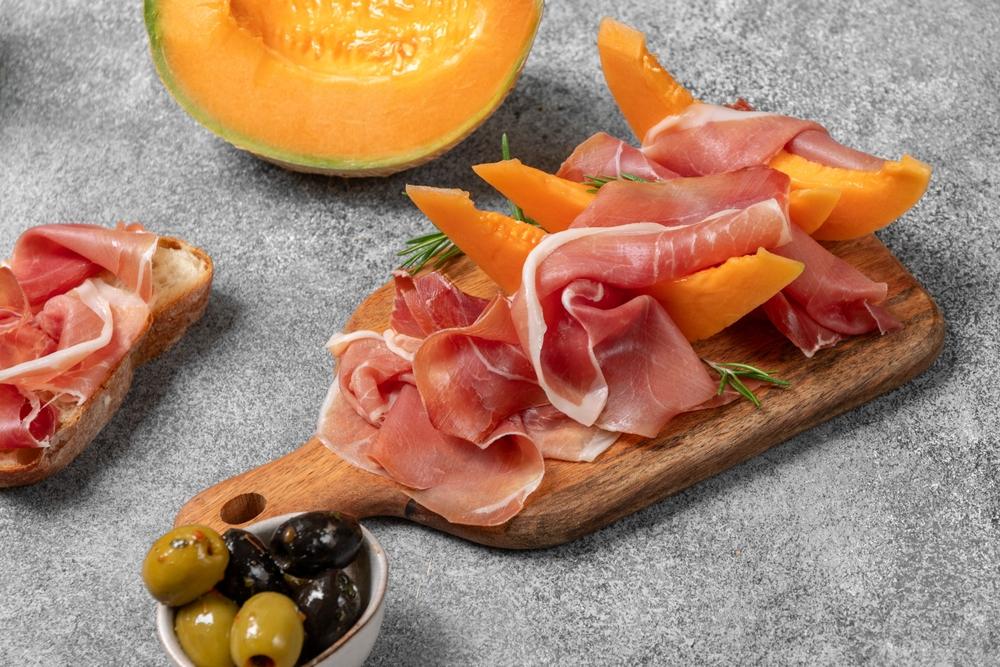 Prosciutto ham is high in protein which combines well with the fiber content of cantaloupe.