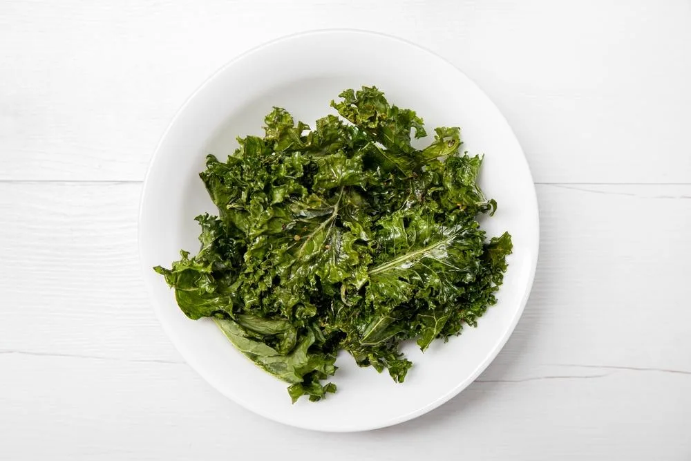 Kale chips are a low-calorie snack rich in antioxidants and fiber.