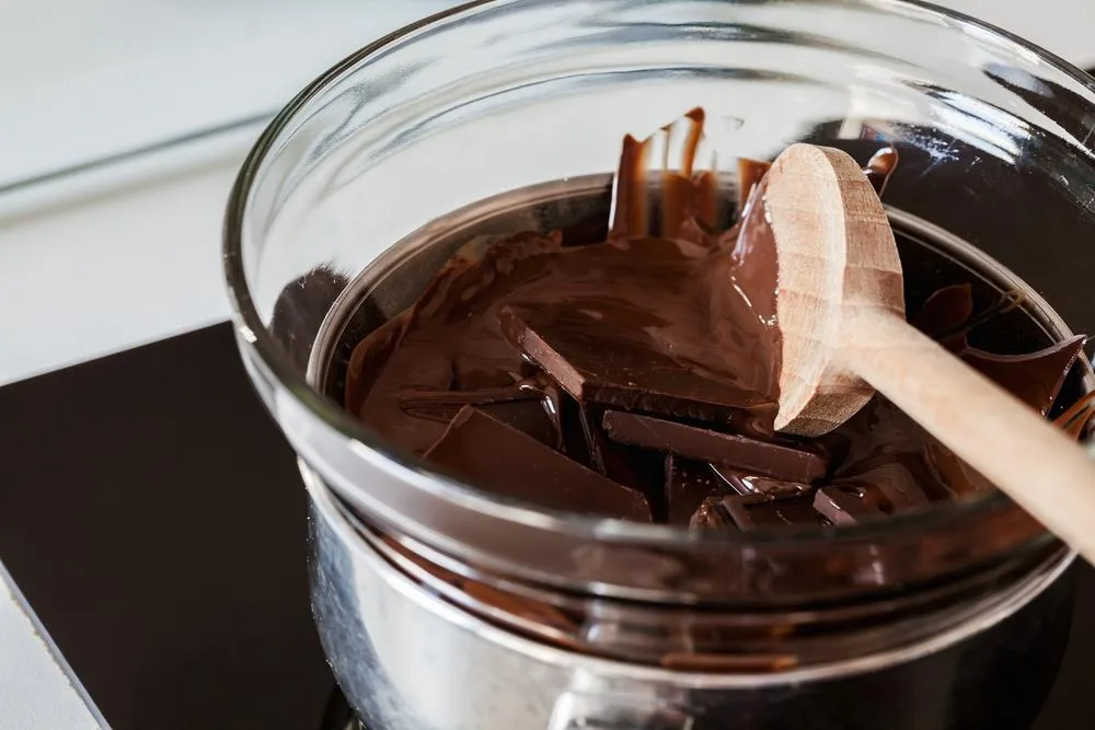 A double boiler is a helpful tool to melt chocolate without burning it.