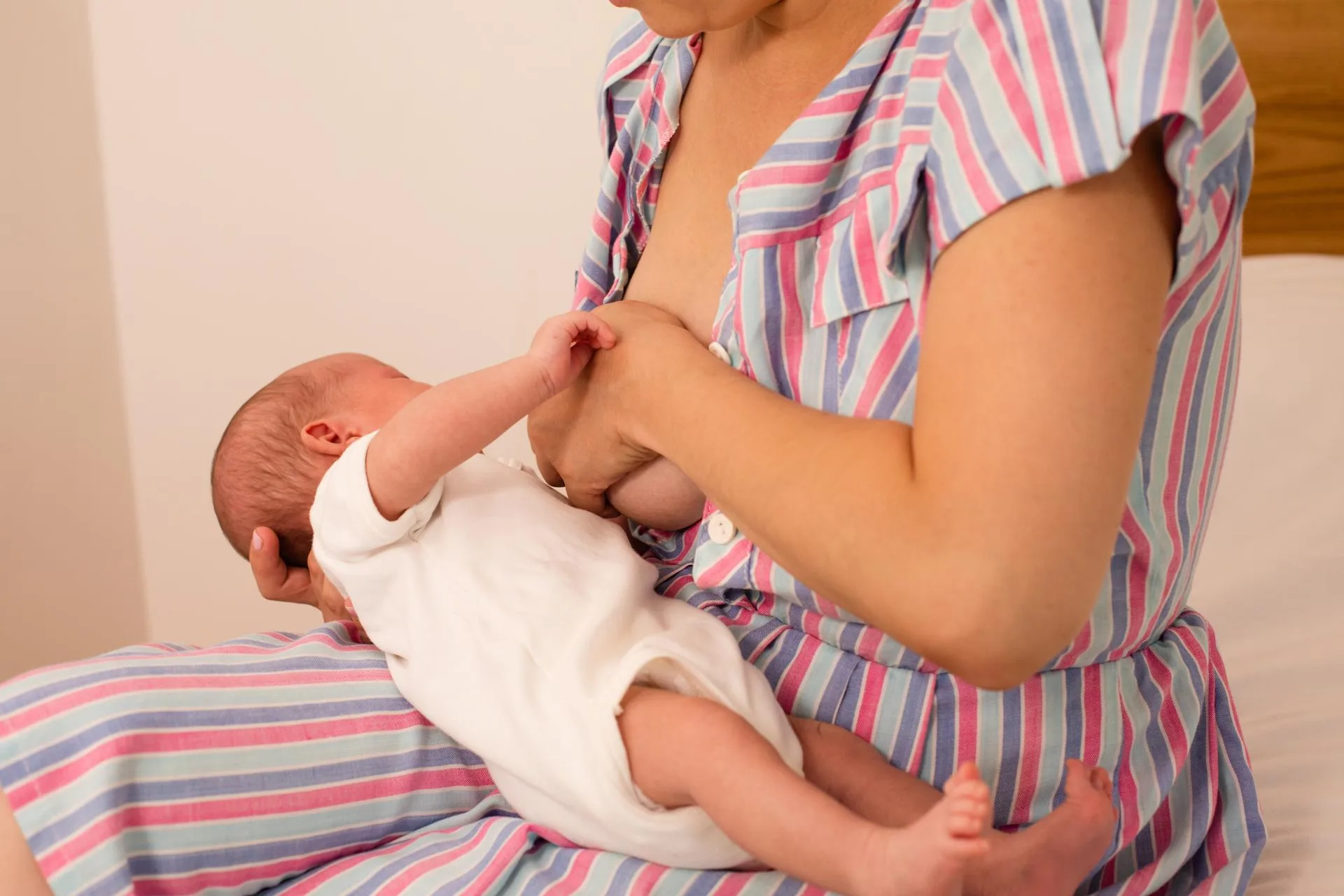 Break the latch while breastfeeding