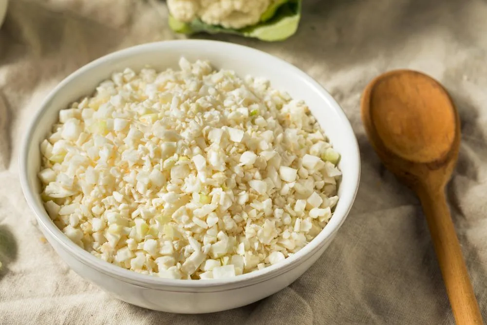 Fresh cauliflower rice in a bowl.