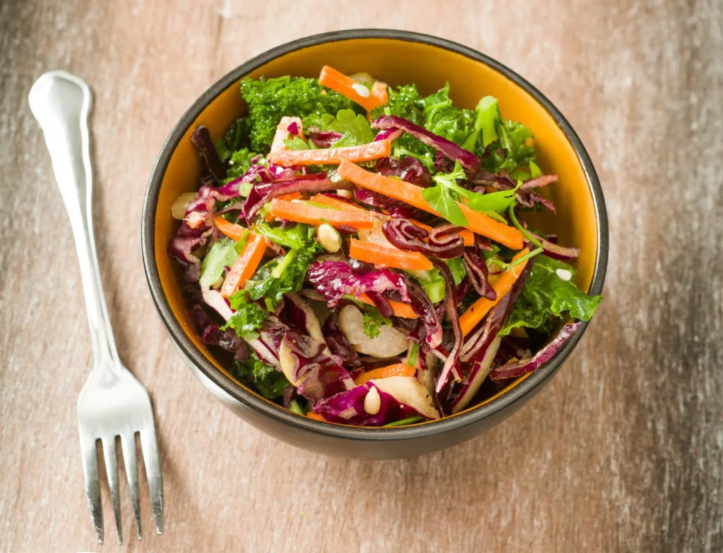 A healthy Kale Salad with Lemon Vinaigrette.