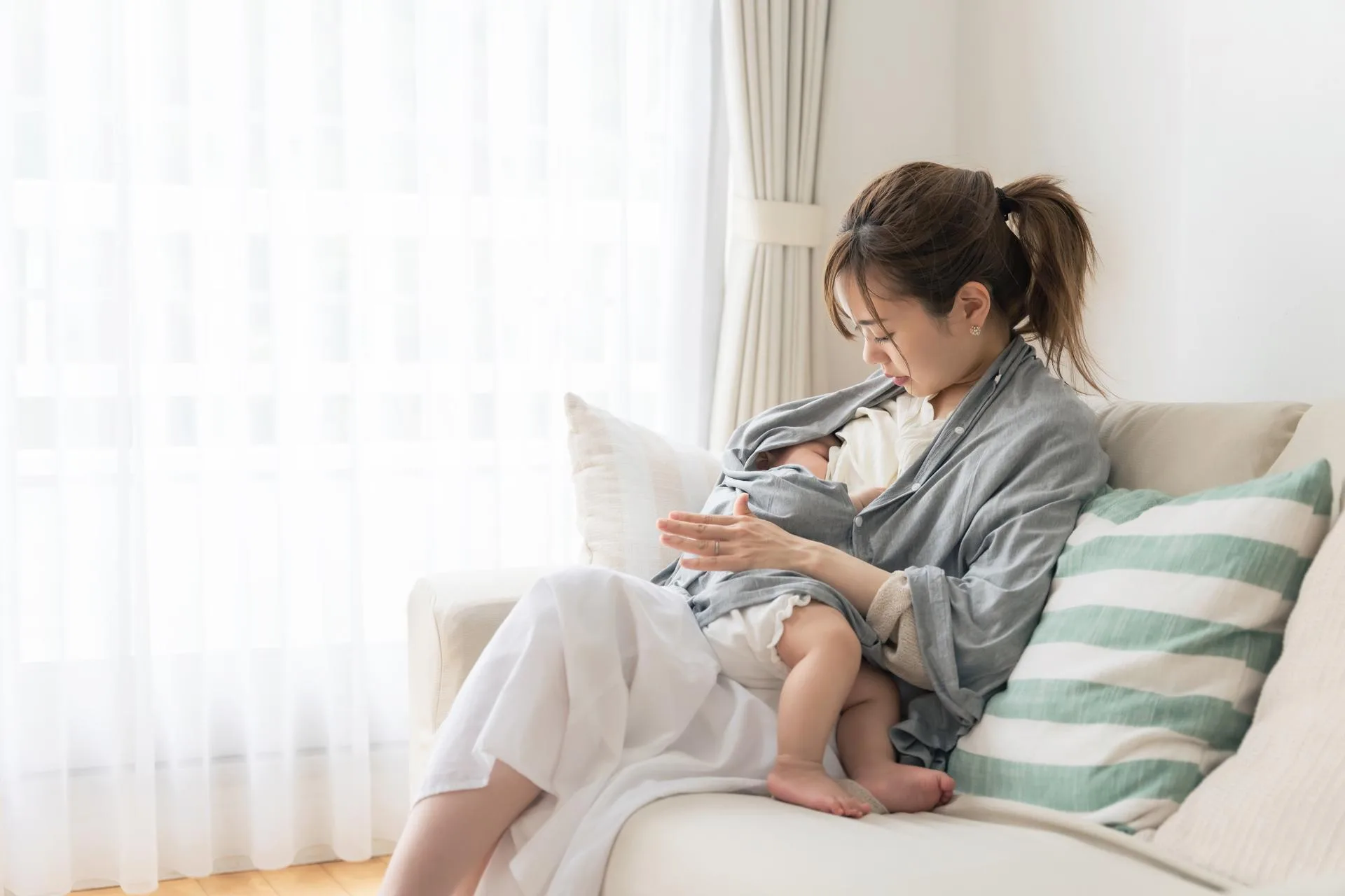 Upright hold (Koala hold) breastfeed