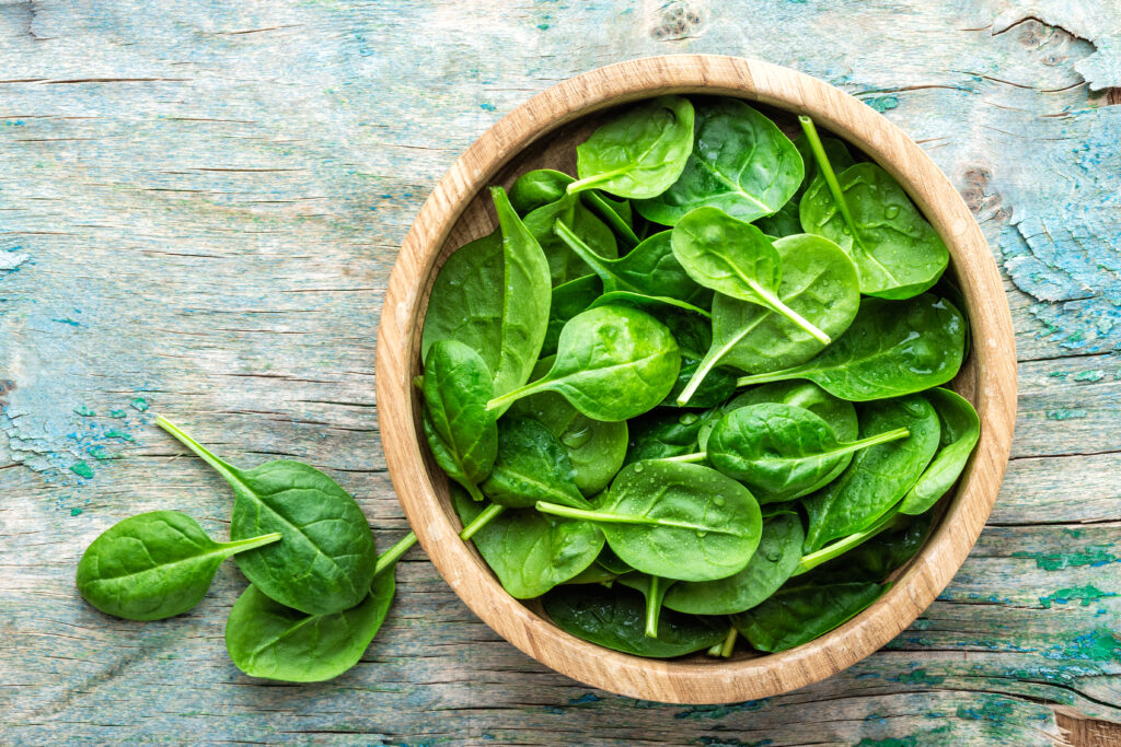 Fresh baby spinach leaves in