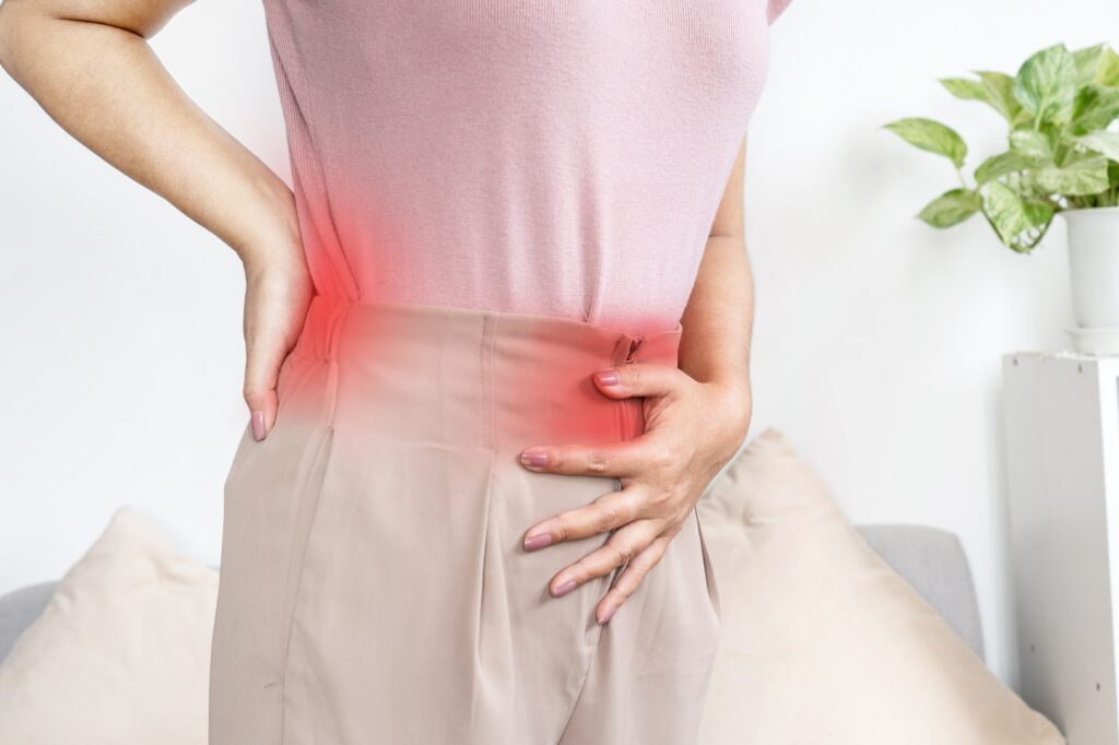 stomach pain radiating to the back: causes, conditions, complications, and when to see doctor